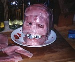 A plastic skull covered with Jello and cold cuts